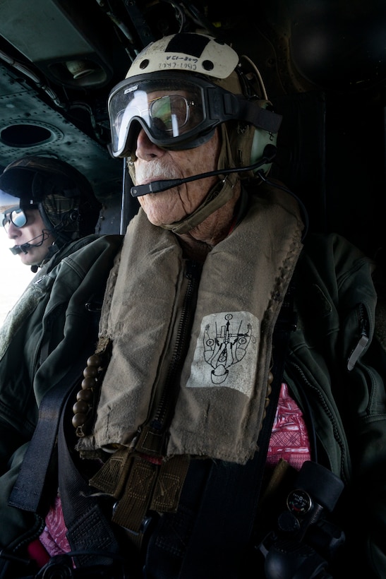 Retired U.S. Marine Corps and Army veteran Maj. Billy Hall, thanks the Marines of Marine Light Attack Helicopter Squadron (HMLA) 267, Marine Aircraft Group 39, 3rd Marine Aircraft Wing, after an honor flight in a UH-1Y Venom with HMLA-267, MAG-39, 3rd MAW, at Marine Corps Air Station Camp Pendleton, California, Nov. 11, 2023. The 97-year-old veteran of World War II, Korea, and Vietnam celebrated the 82nd anniversary of his Marine Corps Recruit Training graduation by flying with the Marines of HMLA-267. (U.S. Marine Corps photo by Sgt. Sean Potter)