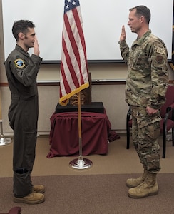 224th ADG Airman reenlists on Nov. 5