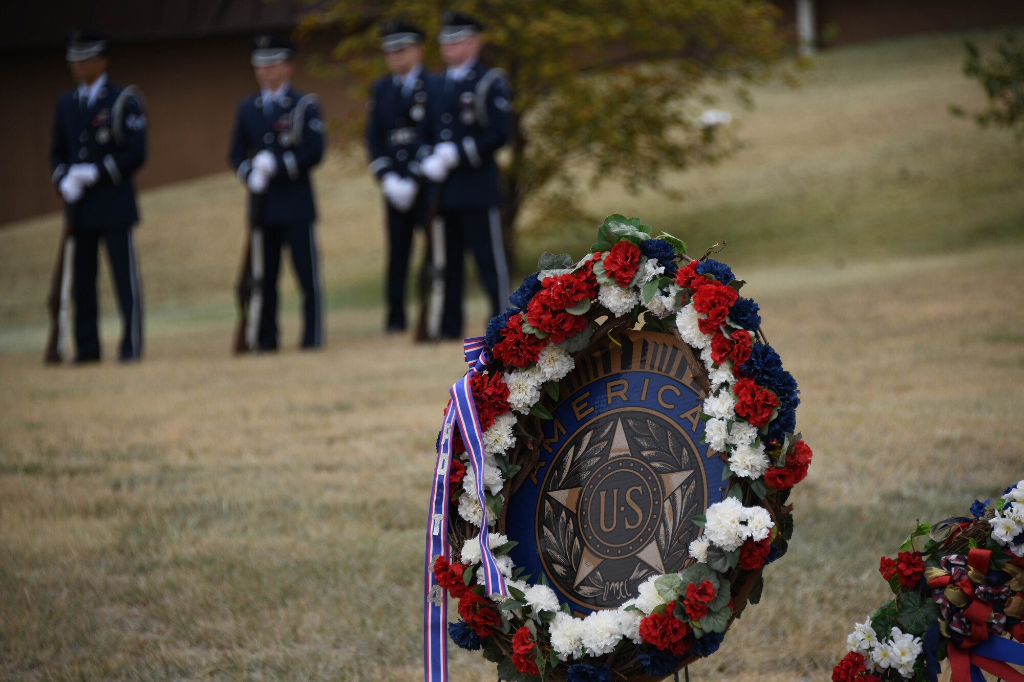 An American Legion wreath is placed at the Jackson County War Memorial in Altus, Oklahoma, Nov. 11, 2023. The wreath is a symbol representing victory, bravery, and peace and is laid to pay tribute to veterans. (U.S. Air Force photo by Senior Airman Miyah Gray)