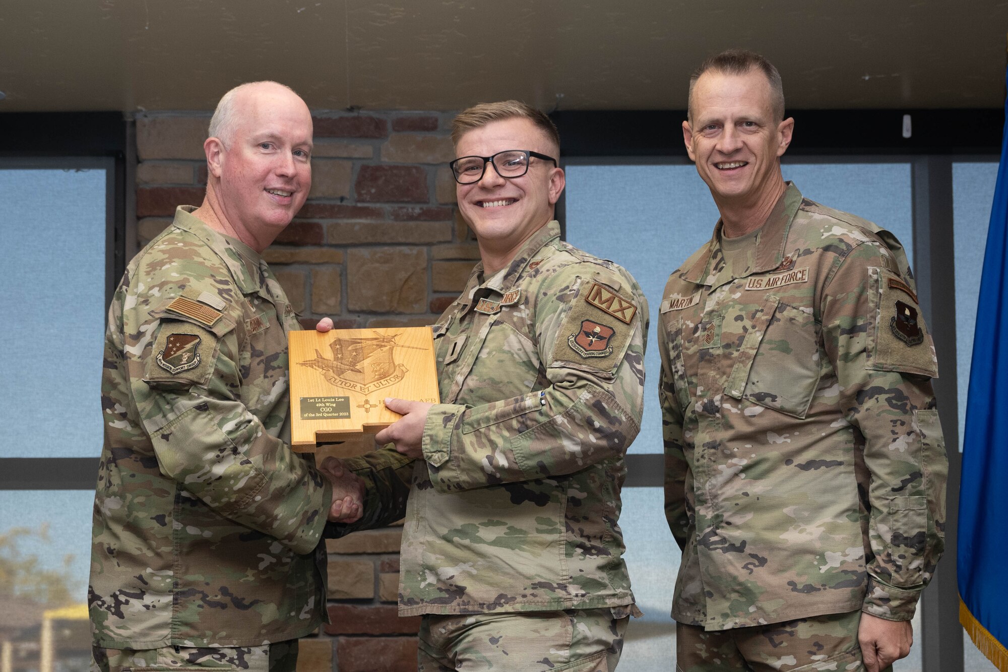 U.S. Air Force 1st Lt. Louis Lee, from the 49th Aircraft Maintenance Squadron, accepts the Company Grade Officer of the Quarter Award, during the 49th Wing’s 3rd Quarter Award ceremony at Holloman Air Force Base, New Mexico, November 9, 2023. Quarterly award winners were selected based on their technical expertise, demonstration of leadership and job performance. (U.S. Air Force photo by Airman 1st Class Bob Teichmann)