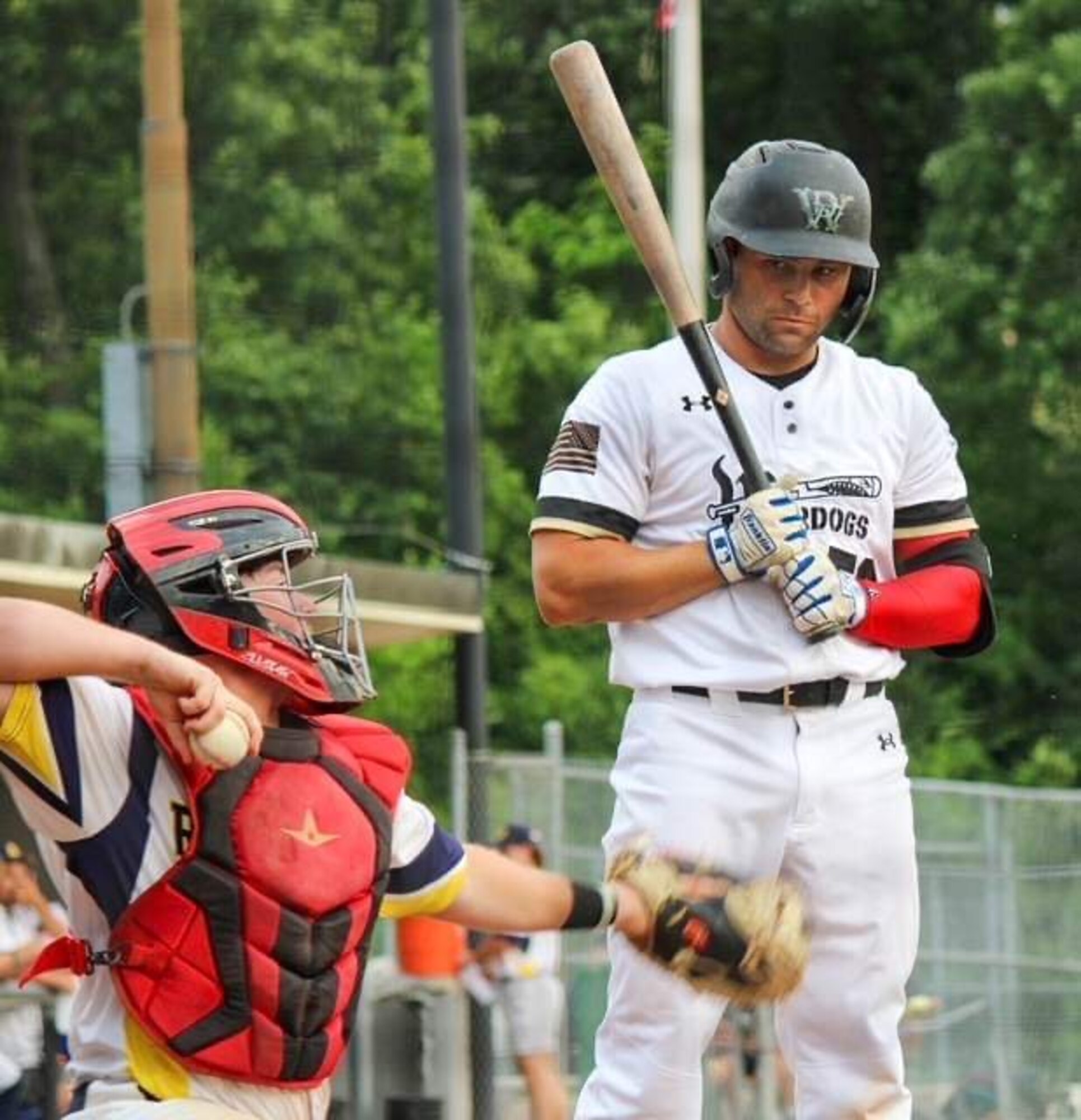 U.S. Air Force Tech Sgt. Travis J. Hackett, 1st Special Operations Security Forces Squadron standardization and evaluation, holds a baseball bat during a WarDogs Baseball game. Hackett enjoyed playing baseball since early childhood.  (Courtesy photo)