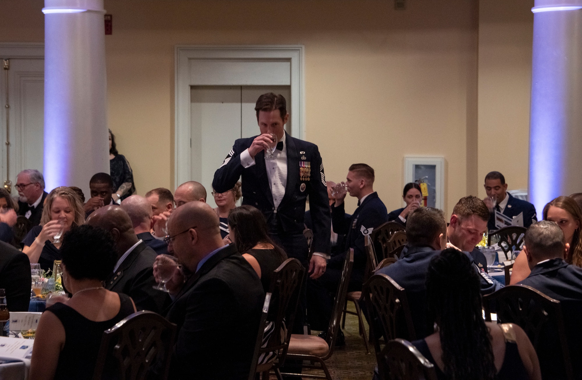 Chief Master Sgt. Alex Eudy, commandant of the Senior Noncommissioned Officer Academy, leads the room in a toast to the 50th Anniversary of the SNCOA during the anniversary gala at the Montgomery Country Club, Montgomery, Ala., Nov. 9, 2023. (U.S. Air Force photo/Tech. Sgt. John Clark)