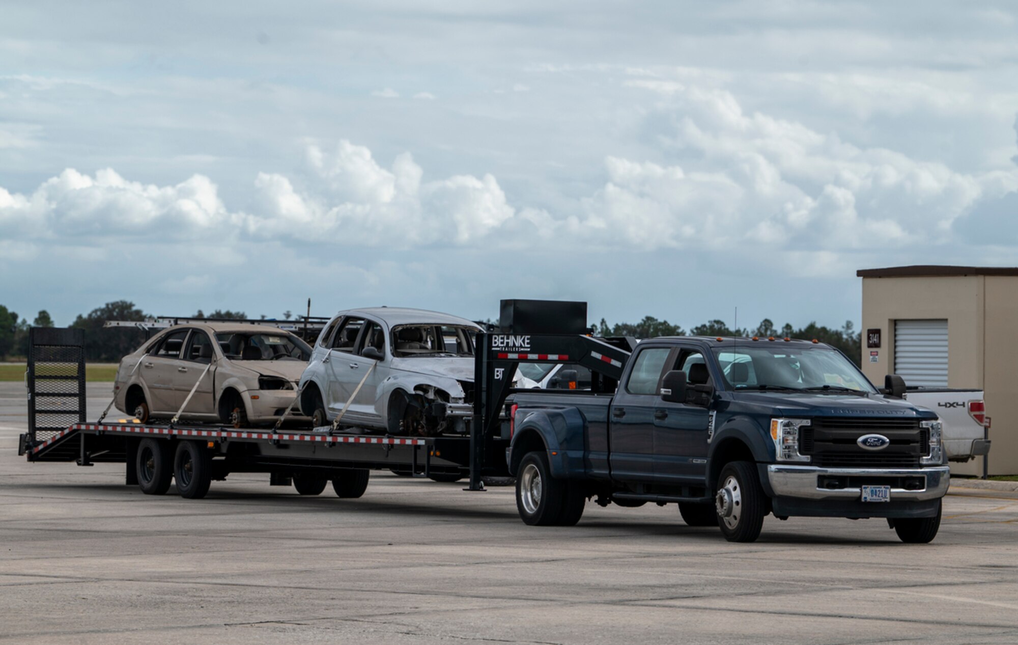 Vehicles are delivered at Avon Park Air Force Range, Florida, Nov 13. 2023, for training targets for A-10C Thunderbolt II pilots during exercise Mosaic Tiger 24-1. Close-air-support and strafing runs are planned throughout the week as part of honing agile-combat-employment concepts. (U.S. Air Force photo by Airman 1st Class Leonid Soubbotine)