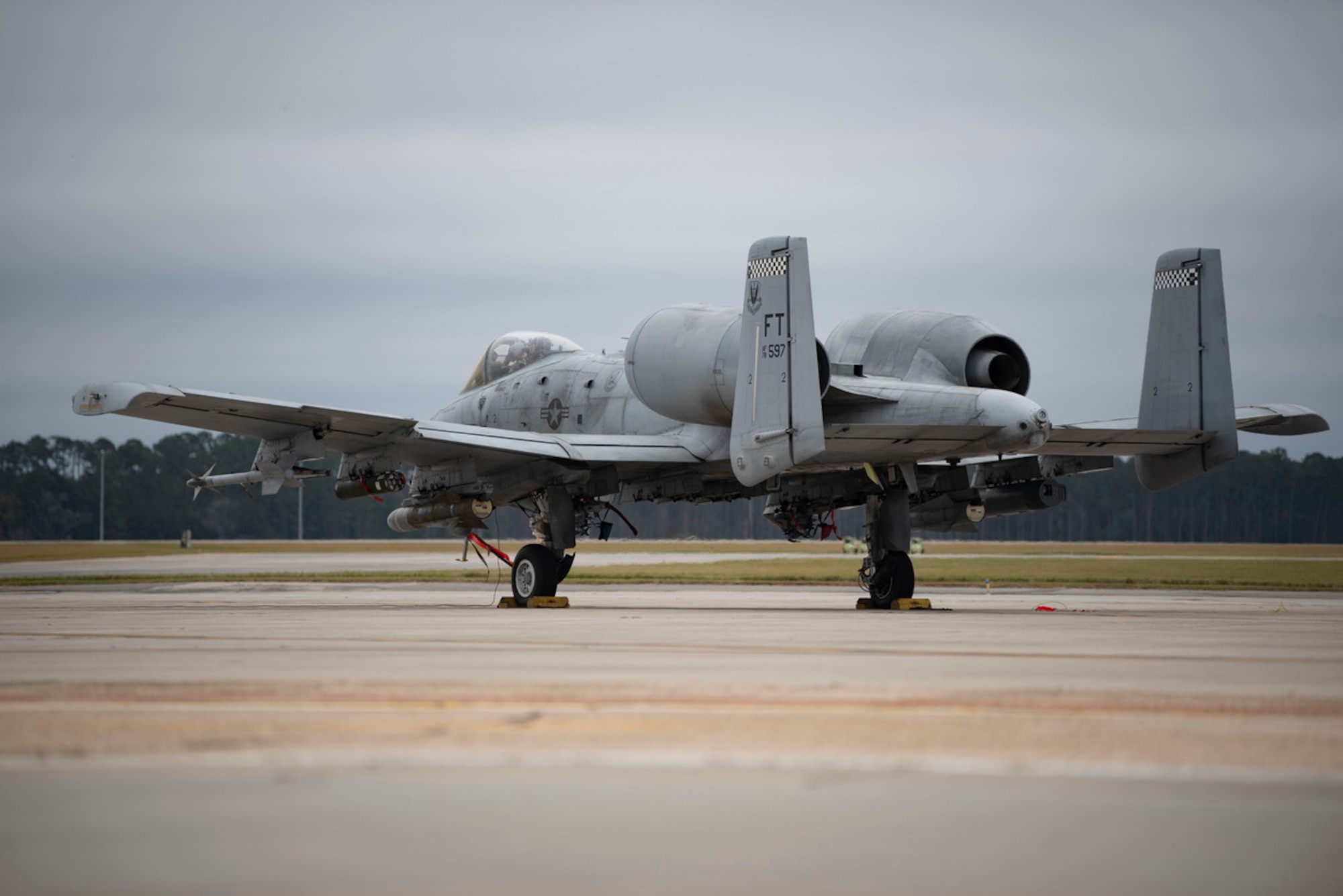 An A-10C Thunderbolt II awaits takeoff during Mosaic Tiger 24-1 at Moody Air Force Base, Georgia, November 13, 2023. During Mosaic Tiger 24-1, the 23rd Wing worked together with partner agencies to train various skills including projecting air power through contested environments, using decentralized command and control, and developing air tasking orders at contingency locations (U.S. Air Force photo by Staff Sgt. Thomas Johns)
