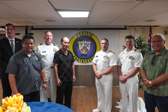 U.S. and Marshallese leaders pose for a group photo aboard the hospital ship USNS Mercy (T-AH 19) during the Pacific Partnership 2024-1 closing ceremony for the Republic of the Marshall Islands mission stop Nov. 10, 2023.Pacific Partnership, now in its 19th iteration, is the largest multinational humanitarian assistance and disaster relief preparedness mission conducted in the Indo-Pacific and works to enhance regional interoperability and disaster response capabilities, increase security stability in the region, and foster new and enduring friendships. (U.S. Navy photo by Mass Communication Specialist Seaman Justin Ontiveros)