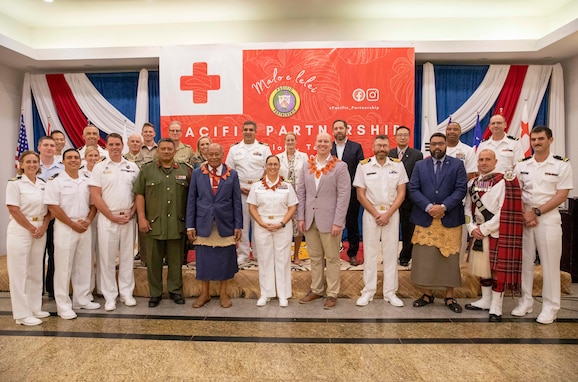 NUKU’ALOFA, Tonga (Nov. 13, 2023) – Pacific Partnership 2023 leadership, Pacific Partnership 2023 staff and Kingdom of Tonga government representatives pose for a group photo after opening ceremony held at International Dateline Hotel in Nuku’alofa, Tonga, Nov. 13. Now in its 18th year, Pacific Partnership is the largest annual multinational humanitarian assistance and disaster relief preparedness mission conducted in the Indo-Pacific. (U.S. Navy photo by Chief Mass Communication Specialist 2nd Class Deirdre Marsac)