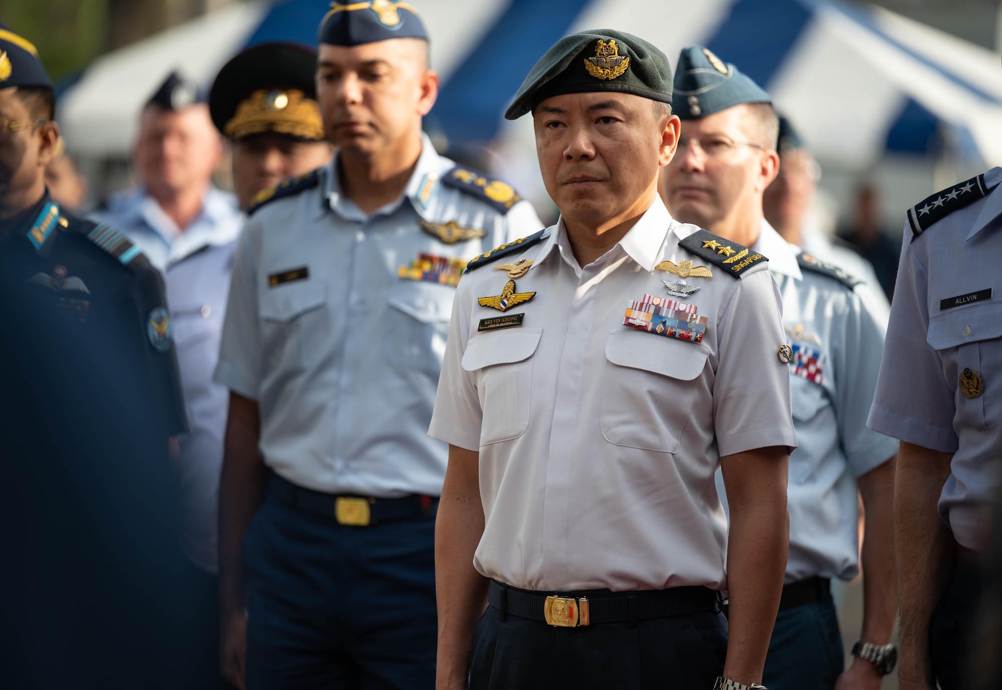 Maj. Gen. Kelvin Khong, Chief of the Republic of Singapore Air Force, stands in formation during the opening ceremony of the Pacific Air Chiefs Symposium 2023 at Joint Base Pearl Harbor-Hickam, Hawaii, Nov. 14, 2023. During the symposium, the senior leaders focused on applying global lessons from recent events and the necessity to preserve peace and prevent conflict in the region. (U.S. Air Force photo by Staff Sgt. Alan Ricker)