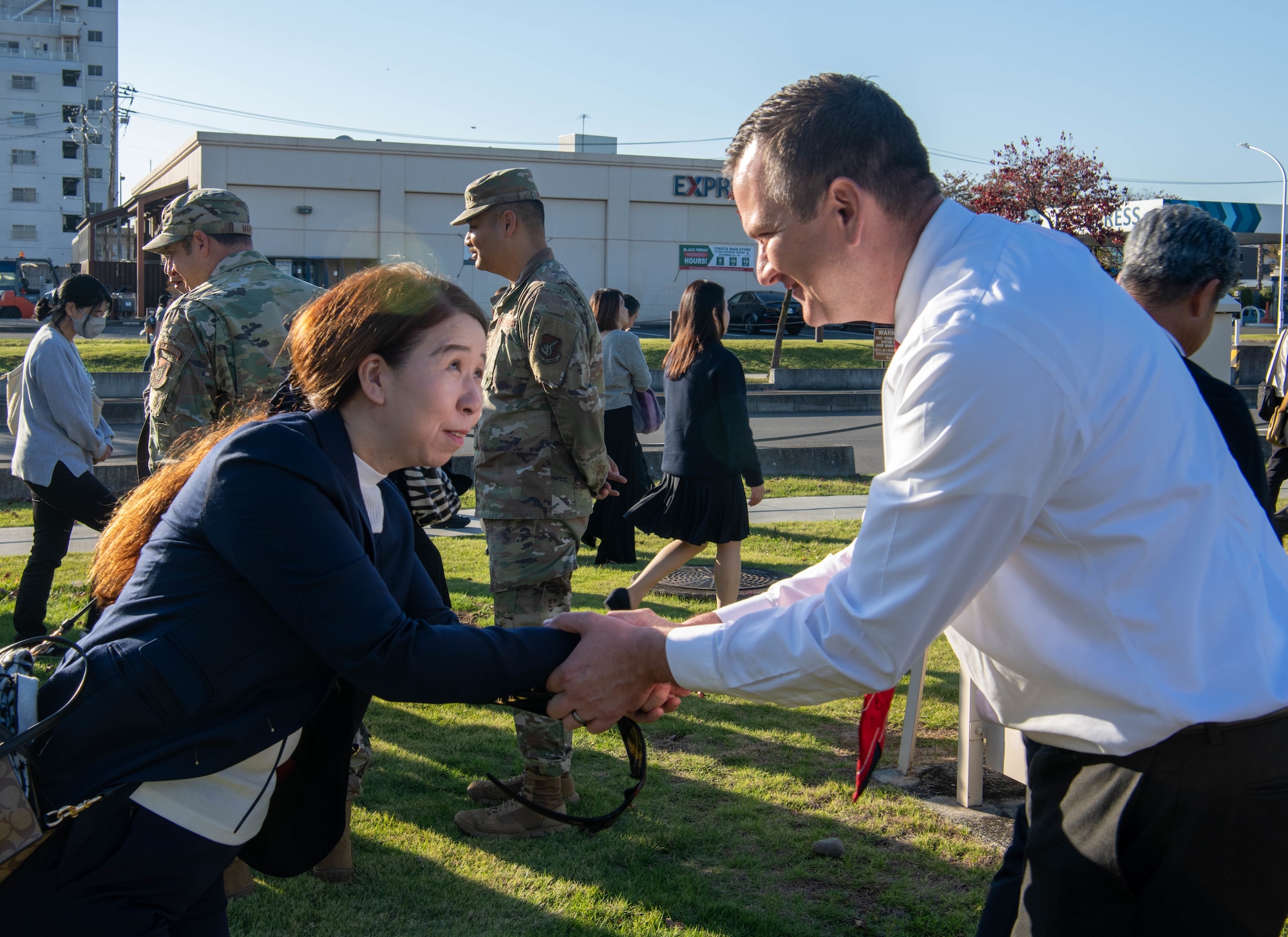 Members of the Akishima-Yokota Friendship Club and 374th Mission Support Group say goodbye.