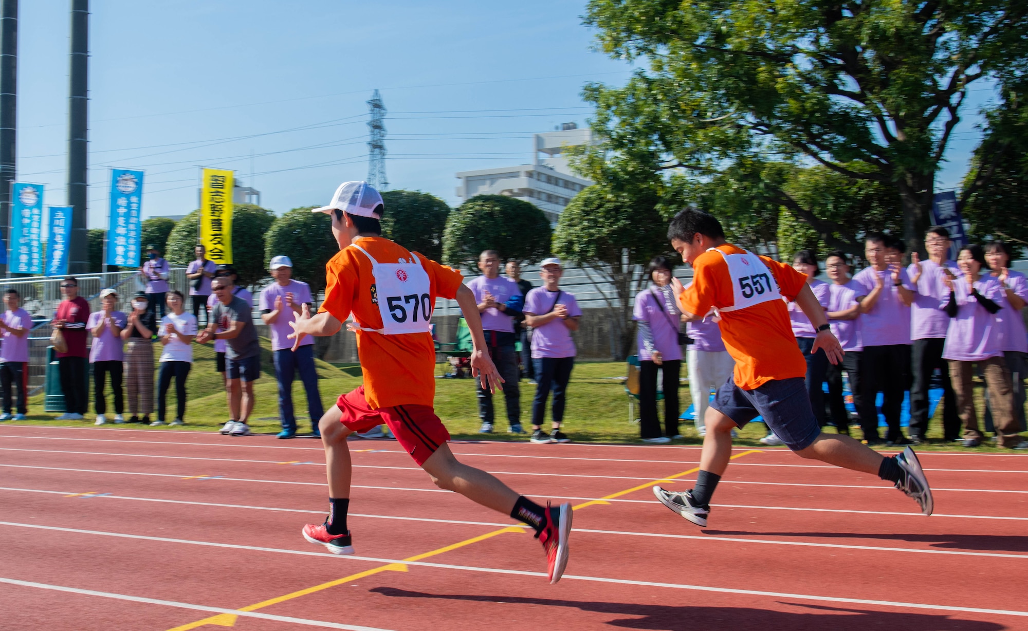 Athletes compete in the 100-meter dash.