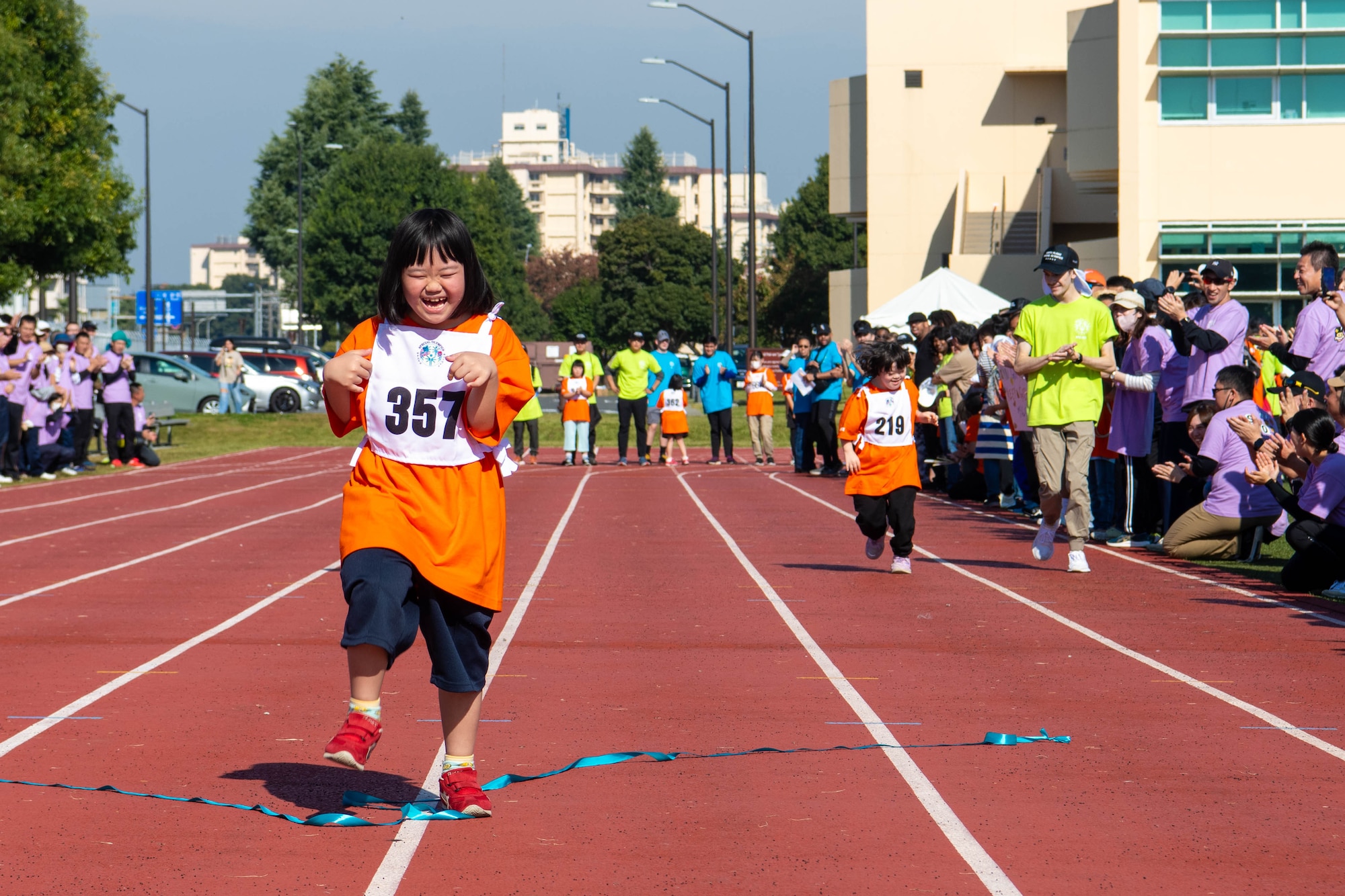 Athletes compete in the 50-meter dash.
