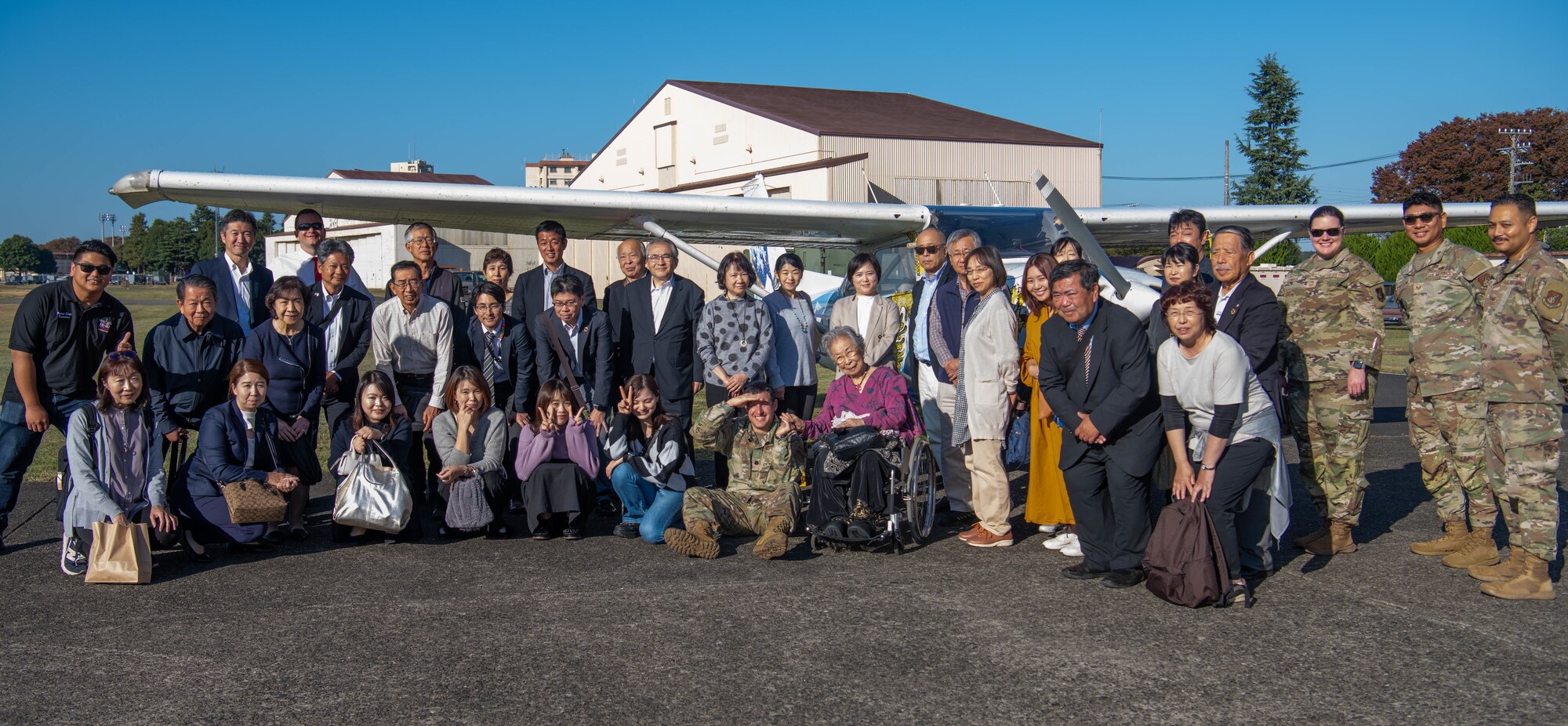 Members of the Akishima-Yokota Friendship Club and the 374th Mission Support Group pose for a photo.