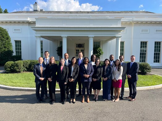  Space Force Lt. Col. Anna Gunn-Golkin, (third from left in the front row), who was selected for a White House Fellowship, stands with her cohorts in front of the White House. (Courtesy photo)