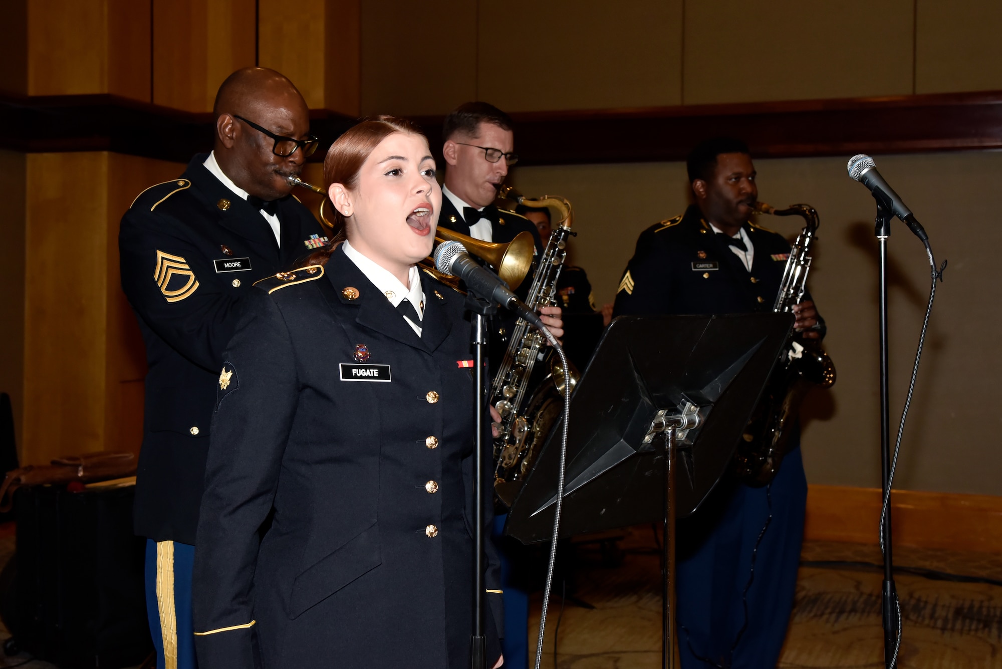 Members of the 313th Army Band, a U.S. Army Reserve Band stationed at Redstone Arsenal in Huntsville, AL, perform during the 76th National Veterans Day awards dinner hosted by the National Veterans Day Foundation on Nov. 10, 2023, in Birmingham, Alabama. A perpetual National Veterans Award was created in Birmingham for America’s first official National Veterans Day observance on November 11, 1954 as authorized by Congress. Its purpose is to honor an outstanding veteran in the United States each year who has made the greatest contribution to further the patriotic interests of veterans and veteran organizations throughout the country; and the award is presented at the National Veterans Award Dinner in Birmingham. (U.S. Air National Guard photo by Staff Sgt. Shelby Thurman)