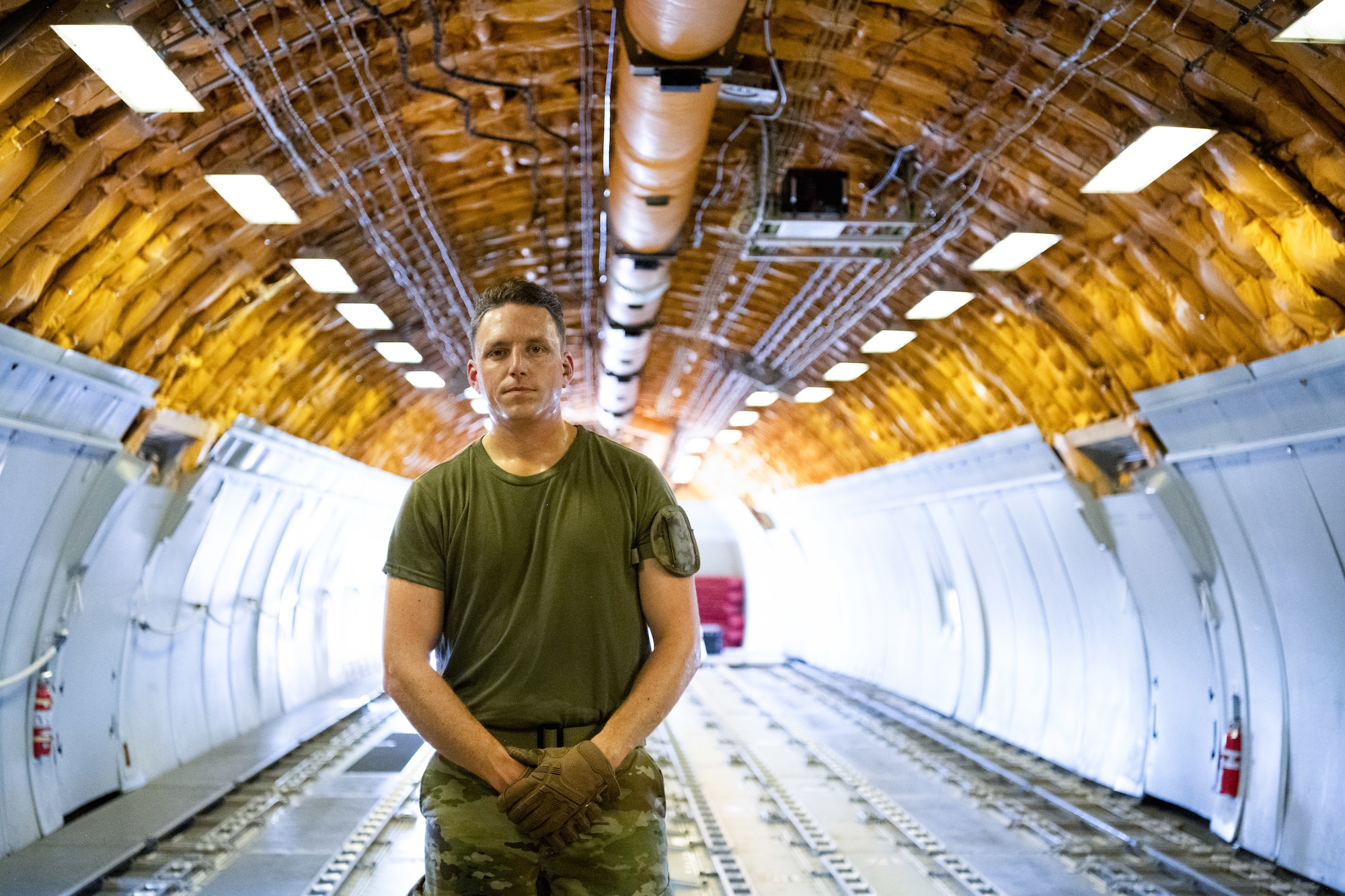 Portrait photo of Senior Airman Kyle Sunderman inside a KC-10 Extender