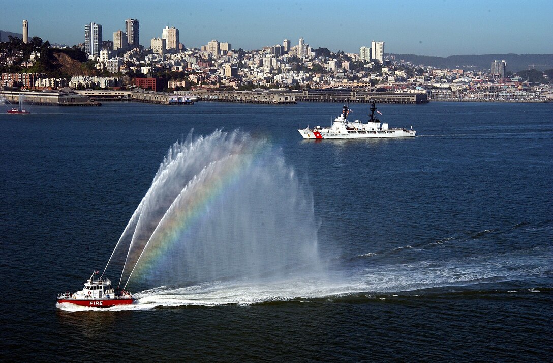 he Coast Guard Cutter Boutwell returns home to Alameda, Calif. to fanfare and water display from an Oakland and San Francisco fire boat.  Boutwell left Alameda on January 3 in support of U.S. operations in the Persian Gulf and the Iraqi War. USCG photo by PACS Bruce Pimental, USCG