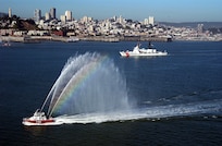 he Coast Guard Cutter Boutwell returns home to Alameda, Calif. to fanfare and water display from an Oakland and San Francisco fire boat.  Boutwell left Alameda on January 3 in support of U.S. operations in the Persian Gulf and the Iraqi War. USCG photo by PACS Bruce Pimental, USCG
