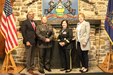 Brig. Gen. Laura A. McHugh, third from left, deputy adjutant general-Army, Pennsylvania National Guard, and respective representatives for the U.S. Army Partnership for Your Success (PaYS) and Pennsylavnia State Police pose for a picture following a U.S. Army PaYS and Pennsylvania State Police partnership signing ceremony November 10, 2023 at Fort Indiantown Gap, Pennsylvania.