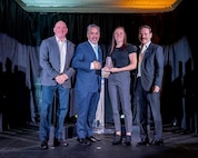 Nevada Air Guard Tech. Sgt. Hannah Kasner, second from right, receives the College of Southern Nevada’s Synergy Award from CSN President Fererico Zaragoza, second from left, in October 2023 in Las Vegas. Kasner was recognized for her work linking the college and Fiji National University through the Department of Defense National Guard Bureau State Partnership Program.