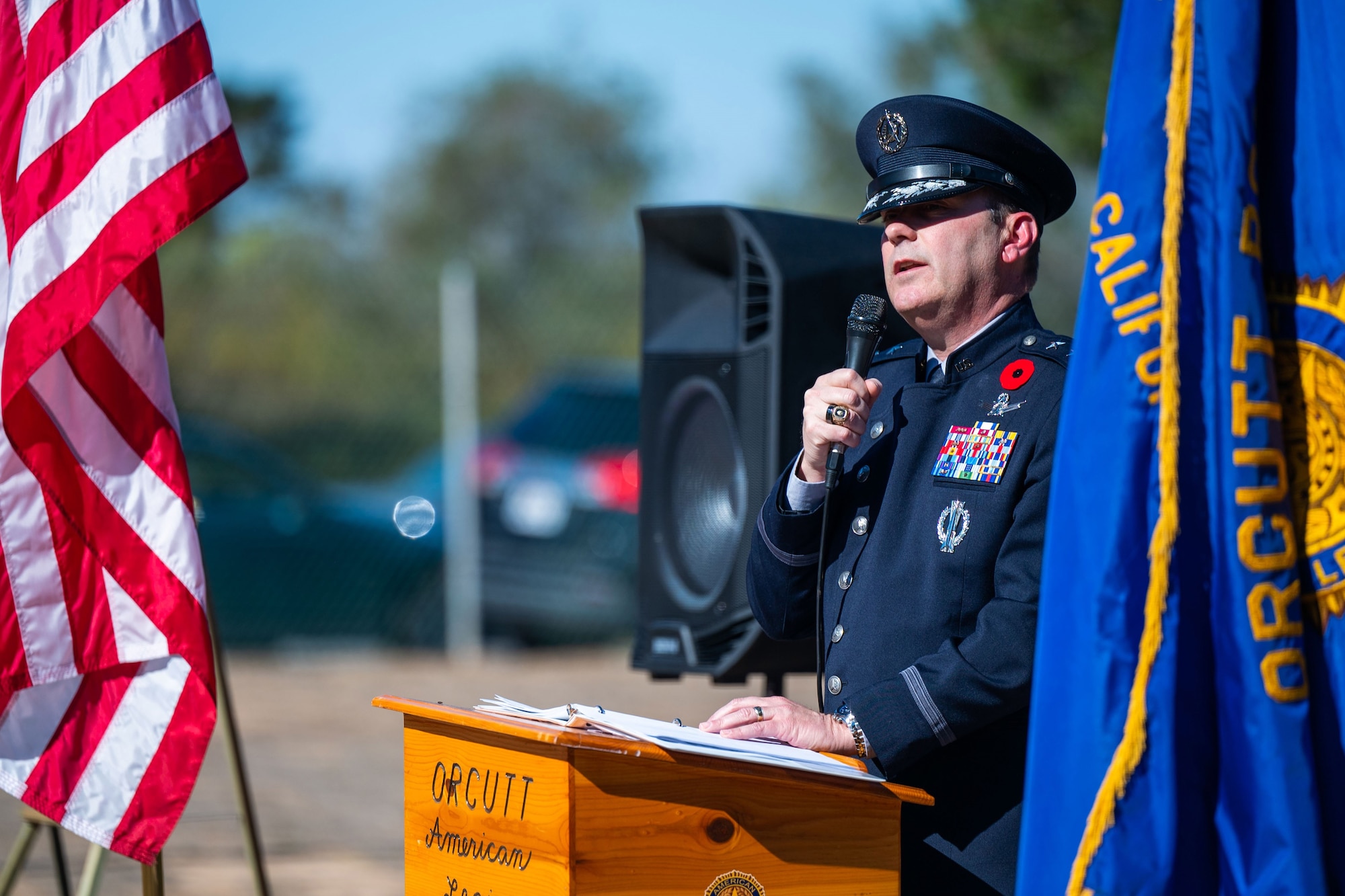 U.S. Space Force Maj. Gen. Douglas A. Schiess, Combined Force Space Component Command commander, provides a commemorative address to audience members during a Remembrance Day ceremony at Pine Grove Cemetery in Orcutt, Calif., Nov. 11, 2023. Combined Force Space Component Command members from the U.S., U.K., Australia, and Canada participated in the ceremony, held by the American Legion Post 534, which was a tribute to those who gave their lives in World War I, and to all the men and women who have served since. (U.S. Space Force photo by Tech. Sgt. Luke Kitterman)
