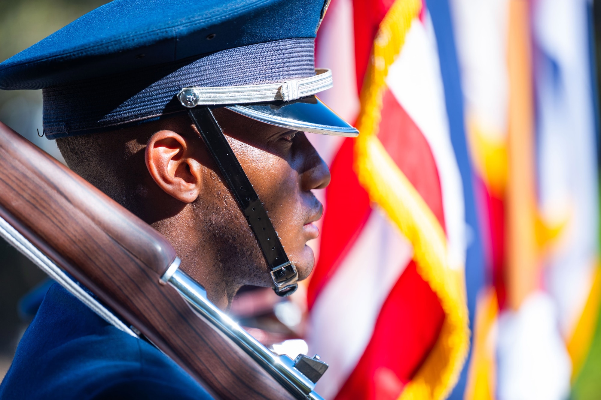 A member of the Vandenberg Base Honor Guard team serves the duty of Rifle Guard as protector of the colors during a Remembrance Day ceremony at Pine Grove Cemetery in Orcutt, Calif., Nov. 11, 2023. Combined Force Space Component Command members from the U.S., U.K., Australia, and Canada participated in the ceremony, held by the American Legion Post 534, which was a tribute to those who gave their lives in World War I, and to all the men and women who have served since. (U.S. Space Force photo by Tech. Sgt. Luke Kitterman)