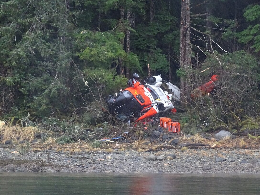 A Coast Guard MH-60 Jayhawk helicopter from Air Station Sitka pends investigation Nov. 14, 2023 after it crashed on Read Island, Alaska. The helicopter crash occurred Nov. 13, at approximately 11:05 p.m. All four crewmembers survived. (U.S. Coast Guard courtesy photo)