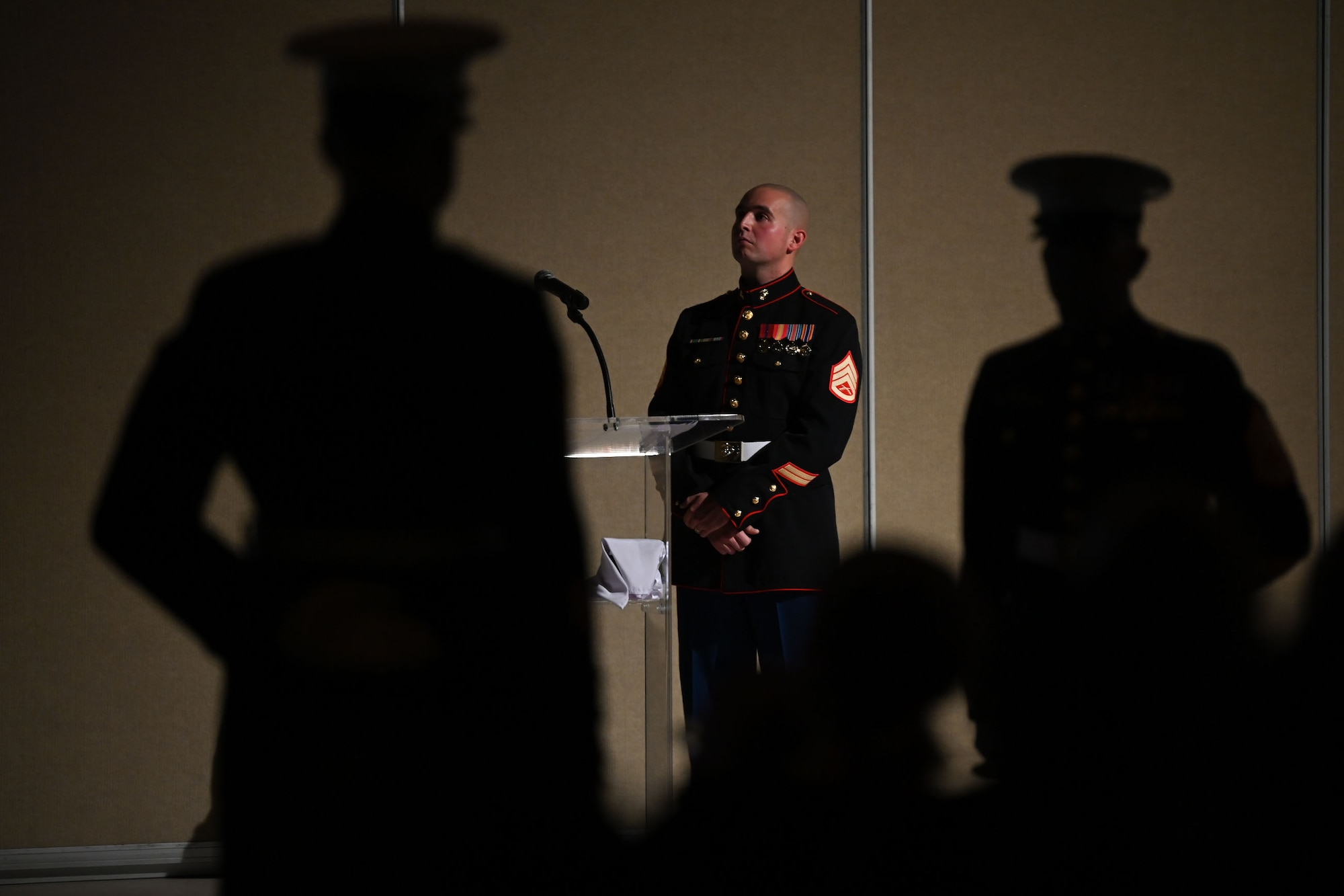 U.S. Marine Corps Staff Sgt. Roland Wendel, 312th Training Squadron fire instructor, stands at the podium during the 248th Marine Corps Birthday Ball at the McNease Convention Center, San Angelo, Texas, Nov. 10, 2023. The Marine Corps Ball is revered as a night to remember with a legacy that carries throughout generations of Marines. (U.S. Air Force photo by Airman First Class Evelyn J. D’Errico)
