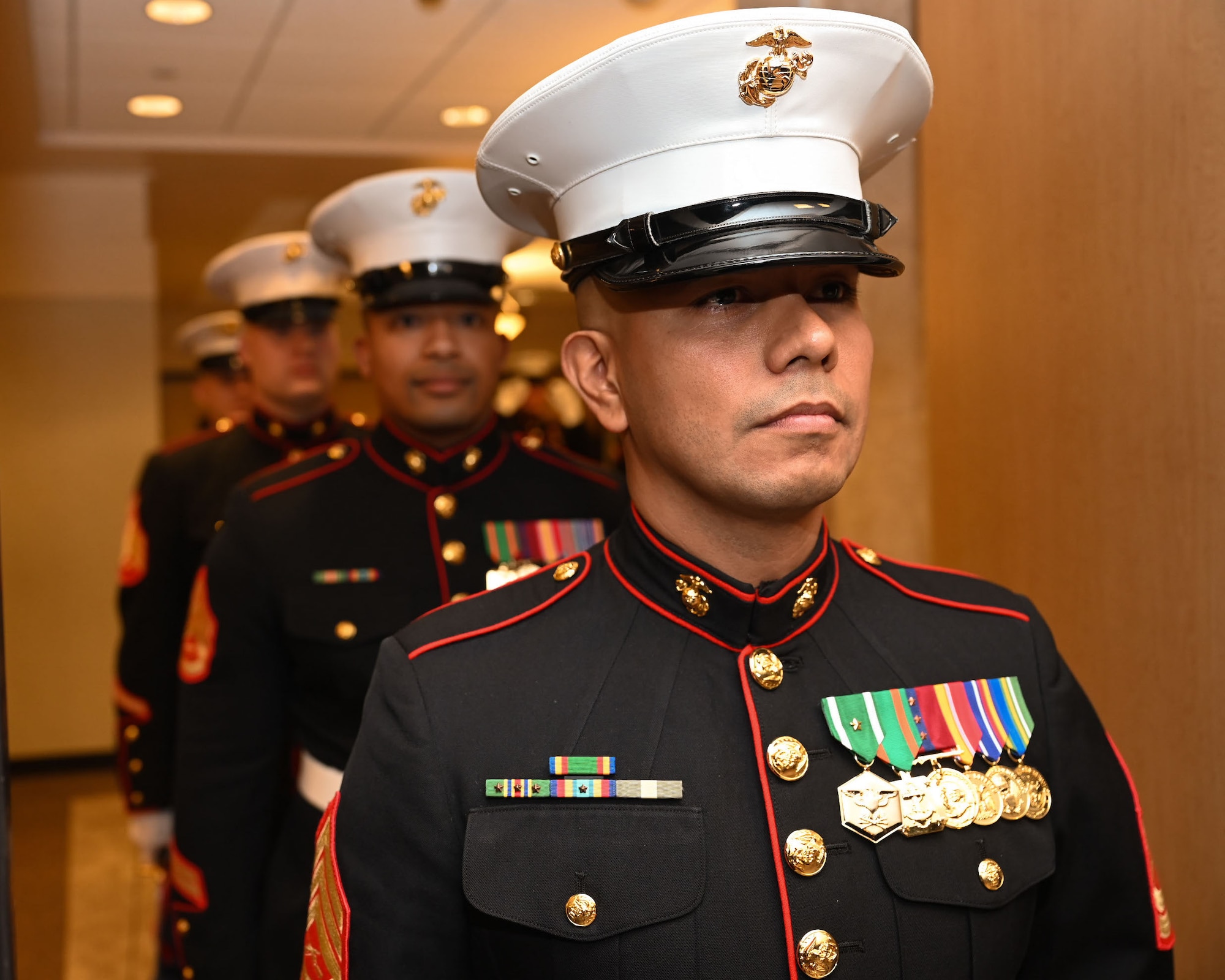 U.S. Marine Corps Gunnery Sgt. Felix Gomez, Marine Corps Detachment Goodfellow supply chief, prepares the sword detail for the presentation of colors during the 248th Marine Corps Birthday Ball ceremony to honor the fallen at the McNease Convention Center, San Angelo, Texas, Nov. 10, 2023. The Marine Corps Birthday Ball is a time-honored tradition celebrating past, present and future Marines. (U.S. Air Force photo by Airman 1st Class Evelyn J. D’Errico)
