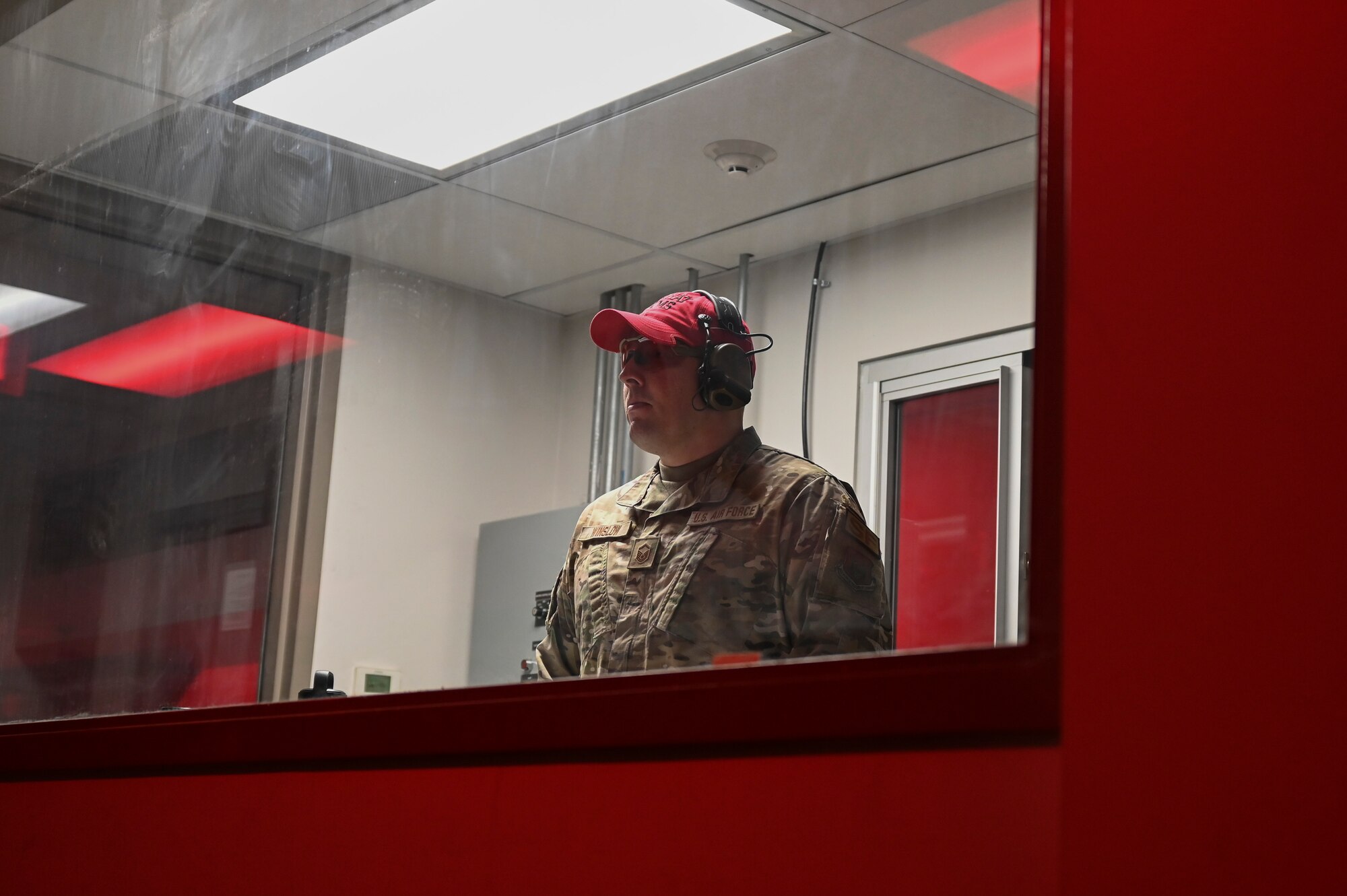 Master Sgt Christopher Winslow, the Combat Arms Training and Maintenance noncommissioned officer-in-charge, 442d Security Forces Squadron, oversees operations at the range November 3, 2023 at Whiteman AFB, Mo.