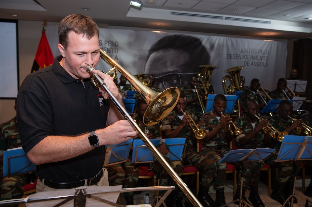U.S. Air Force Staff Sgt. Brian Logan, assigned to the U.S. Air Forces in Europe and Air Forces Africa (USAFE-AFAFRICA) Band’s Five Star Brass, plays the trombone during a rehearsal at the Dr. Antonio Agostinho Neto Memorial in Luanda, Angola, Nov. 6, 2023. The USAFE-AFAFRICA Band’s tour to Angola embodies the U.S. Air Forces Africa’s dedication to strengthening cultural ties and enriching the partnerships between the U.S. and Angola through music. (U. S Department of Defense photo by Mass Communication Specialist 2nd Class Michael Hogan)