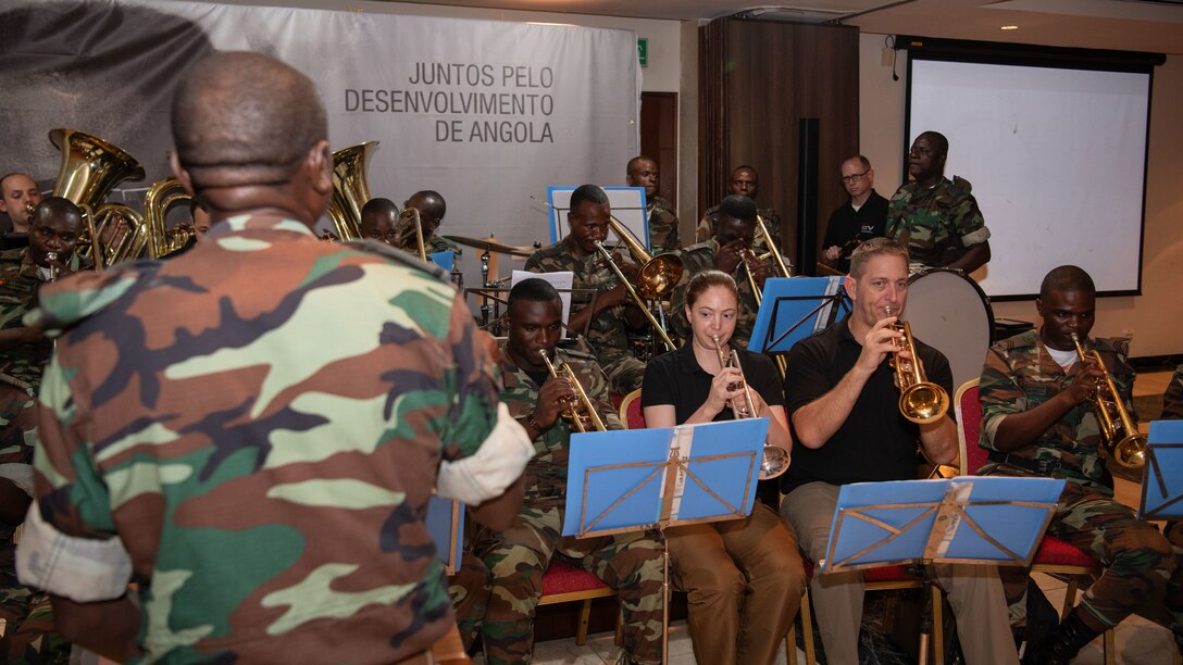 Members of the U.S. Air Forces in Europe and Air Forces Africa Band’s Five Star Brass and the Angolan Armed Forces Band rehearse for a concert.