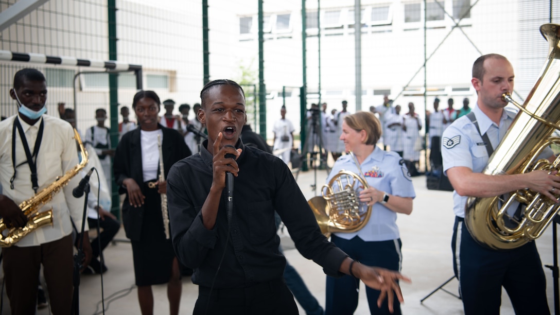 U.S. Airmen with the U.S. Air Forces in Europe and Air Forces Africa (USAFE-AFAFRICA) Band’s Five Star Brass perform alongside students from the Polytechnic Institute of Art in Kilamba, Angola, Nov. 9, 2023. The USAFE-AFAFRICA Band’s tour to Angola embodies the U.S. Air Forces Africa’s dedication to strengthening cultural ties and enriching the partnerships between the U.S. and Angola through music. (U.S. Department of Defense photo by Mass Communication Specialist 2nd Class Michael Hogan)