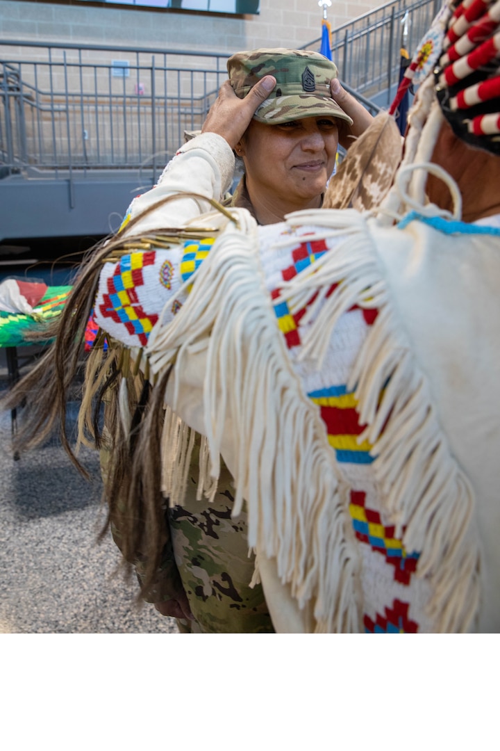 Elizabeth “Promise” Crawford was promoted to the rank of sergeant major in the South Dakota Army National Guard by Larry Wetsit during a ceremony at Joint Force Headquarters on Camp Rapid, Rapid City, S.D., Nov. 9, 2023. She is the first female Native American sergeant major in the SDNG.