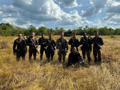 U.S. and Brazilian Army field artillery Soldiers pose for photo in Ferreira Gomes, Brazil, Nov. 12, 2023. The two State Partnership Program partners trained together during exercise Southern Vanguard 24 to enhance interoperability and shared capabilities.