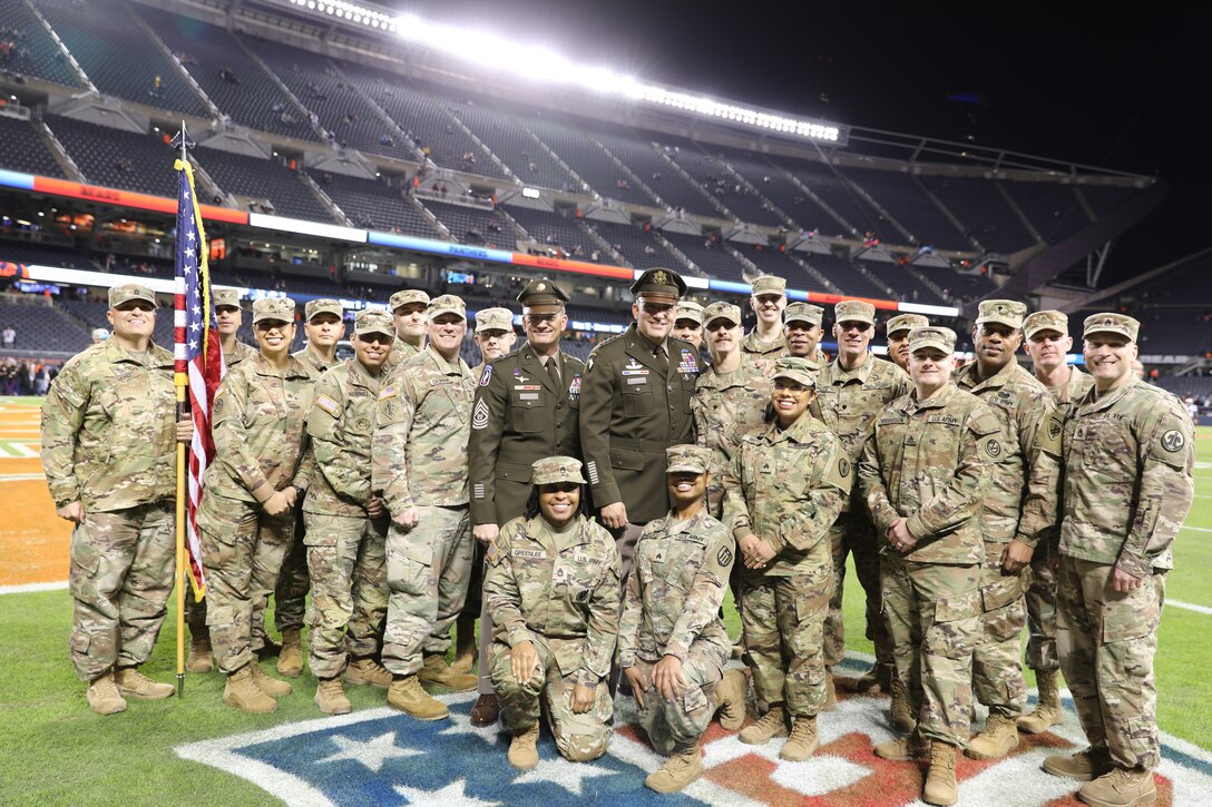 Soldiers Reenlist, Jump and Sing at the Chicago Bears Salute to Service Game