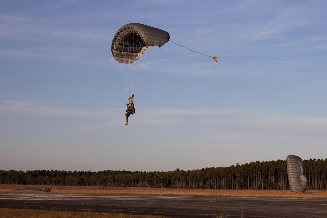 A Marine parachutes to the ground.