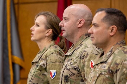 Brig. Gen. Paige M. Jennings, U.S. Army Financial Management Command commanding general; Lt. Col. Jason Shick, 45th Finance Center acting director; and Master Sgt. Daniel Reyes Baerga, 45th FC acting senior enlisted advisor, sing the Army Song during a ceremony reactivating the 45th FC at the Maj. Gen. Emmett J. Bean Federal Center in Indianapolis Nov. 6, 2023. The activation of the 45th FC stems from a series of changes to the Army’s Finance Corps outlined in a Force Design Update Jr. that was signed earlier this year. (U.S. Army photo by Staff Sgt. Joshua Syberg)