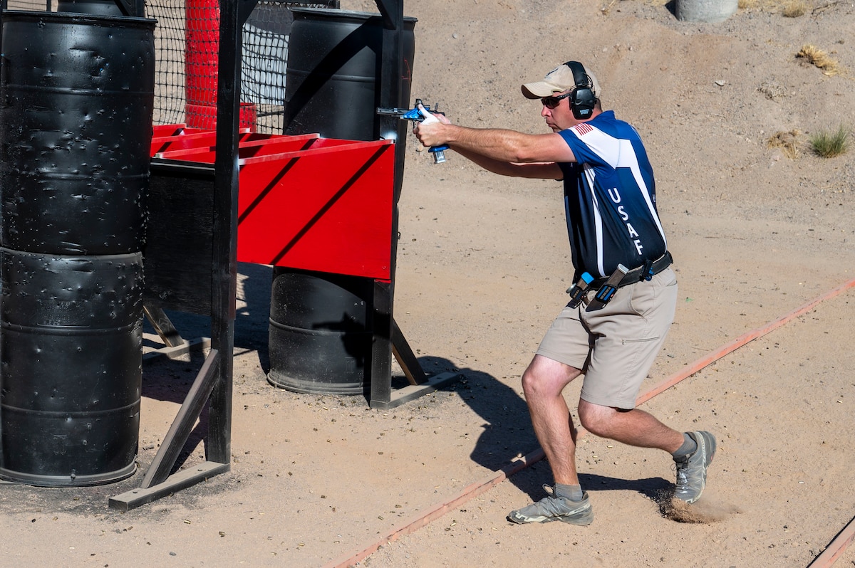 U.S. Air Force Master Sgt. Robert Wilson, 22nd Security Forces Squadron flight chief, competes in a shooting competition at Rio Salado Sportsman’s Club in Mesa, Ariz., Nov. 10, 2023. Wilson was the captain of the USAF Action Shooting Team.