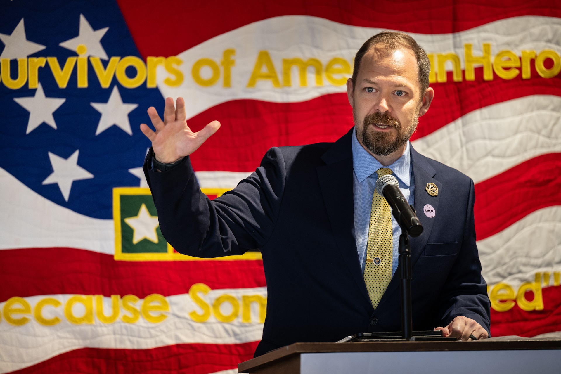 Chad Graham, president and CEO of the Woody Williams Foundation, speaks to audience members on Millionaire’s Row at Churchill Downs Racetrack in Louisville, Ky., Nov. 5, 2023, as part of Survivor’s Day at the Races, an annual event to honor family members who've lost loved ones in military service to the United States. The foundation actively supports Gold Star Family outreach programs across the nation in remembrance of fallen service members. (U.S. Air National Guard photo bay Dale Greer)