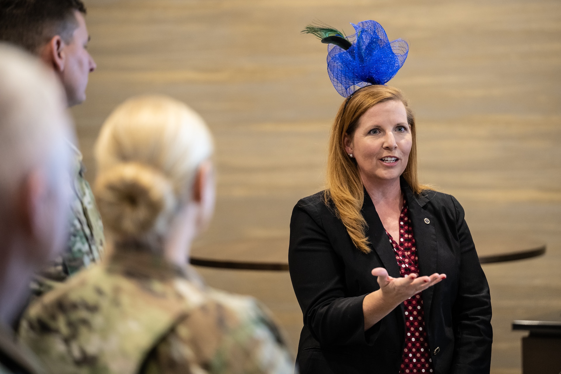 Amy Dozier, outreach and education specialist for the Woody Williams Foundation, speaks to distinguished visitors at Churchill Downs Racetrack in Louisville, Ky., Nov. 5, 2023, as part of Survivor’s Day at the Races, an annual event to honor family members who have lost loved ones in military service to the United States. The foundation actively supports Gold Star Family outreach programs across the nation in remembrance of fallen service members. (U.S. Air National Guard photo bay Dale Greer)