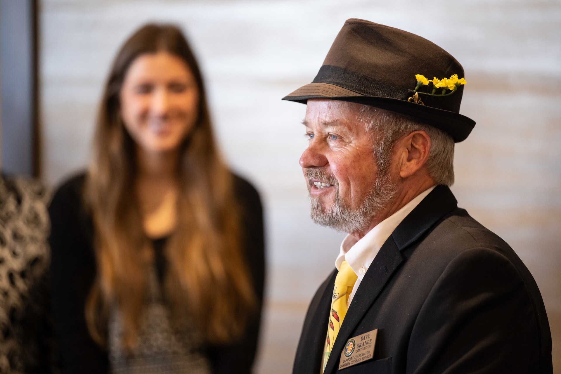 David Orange, a support coordinator for the U.S. Army’s Survivor Outreach Services, greets distinguished visitors at Churchill Downs Racetrack in Louisville, Ky., Nov. 5, 2023, as part of Survivor’s Day at the Races, an annual event to honor family members who have lost loved ones in military service to the United States. Hosted with assistance from the Kentucky National Guard, the event drew more than 700 family members from 18 states. (U.S. Air National Guard photo bay Dale Greer)