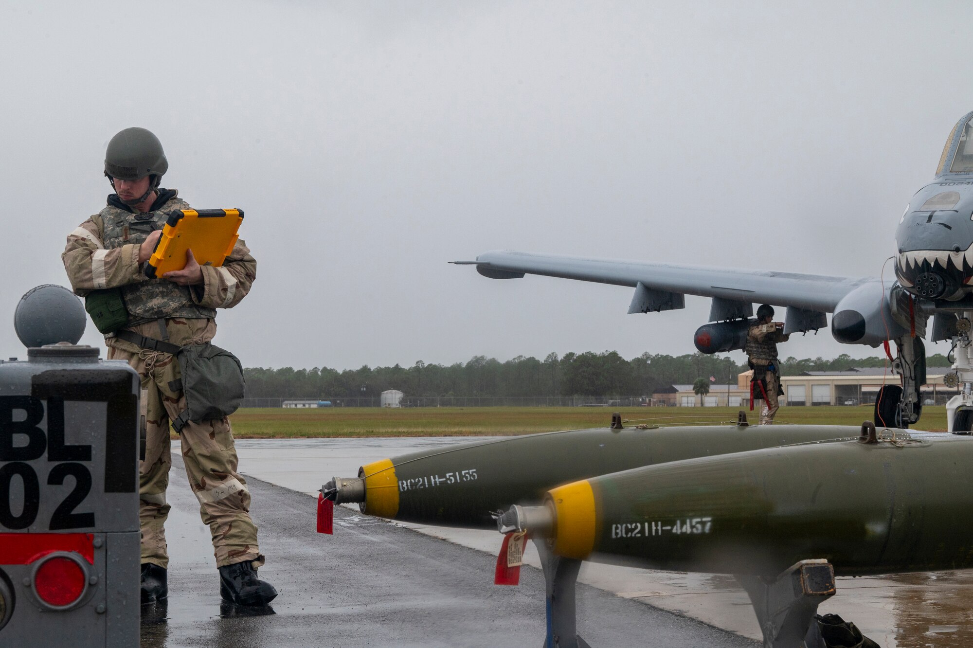 U.S. Air Force Tech. Sgt. Keith Bryan, 74th Fighter Generation Squadron weapons expediter, checks a rocket pod at Avon Park Air Force Range, Florida, Nov. 15, 2023. The less then ideal weather and bulky exercise protective gear further tested the multi-capable Airmen team on their speed and efficiency to relaunch the A-10C Thunderbolt IIs as fast as possible.
(U.S. Air Force photo by Airman 1st Class Leonid Soubbotine)