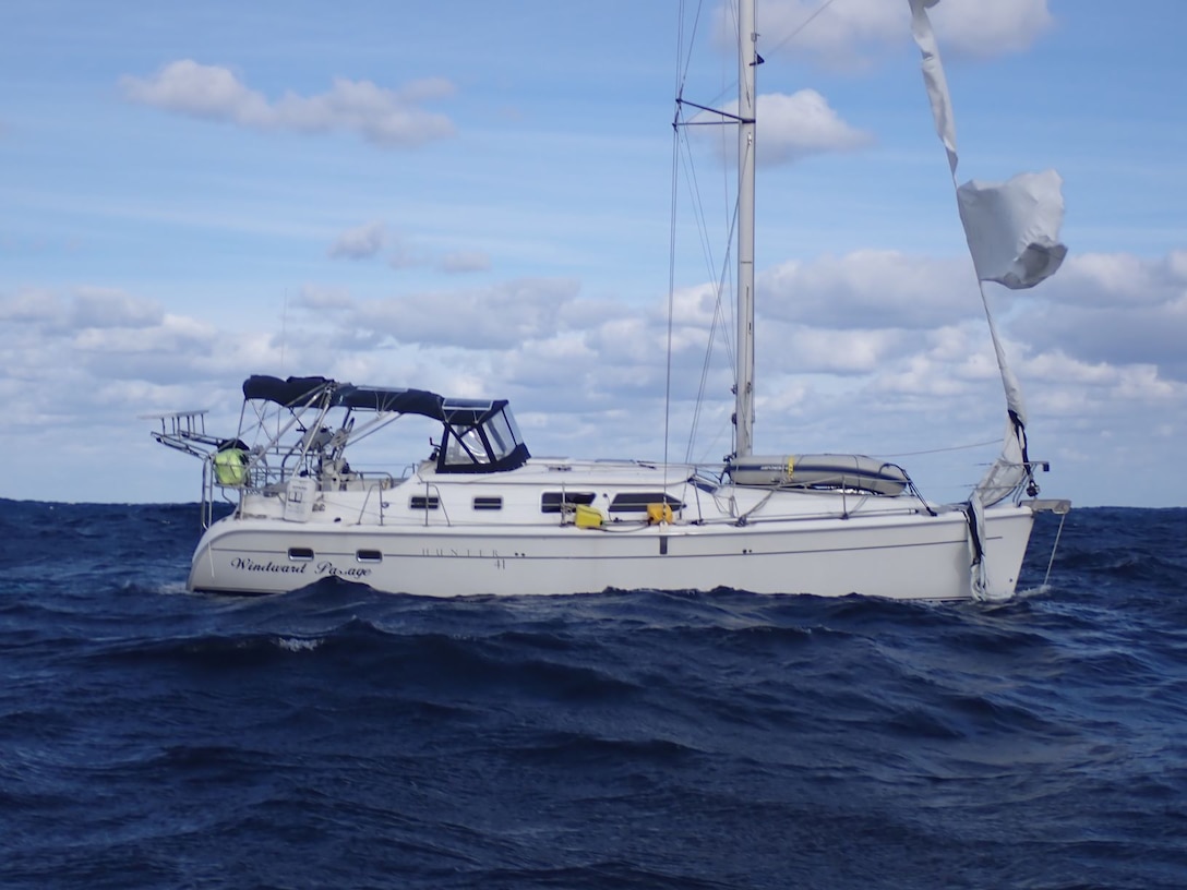 The sailing vessel Windward Passage floats adrift 270 nautical miles from Hatteras, North Carolina, Nov. 15, 2023. The crew of the Coast Guard Cutter Lawrence Lawson, based in Cape May, New Jersey, arrived on scene and safely transferred the mariner aboard the cutter.