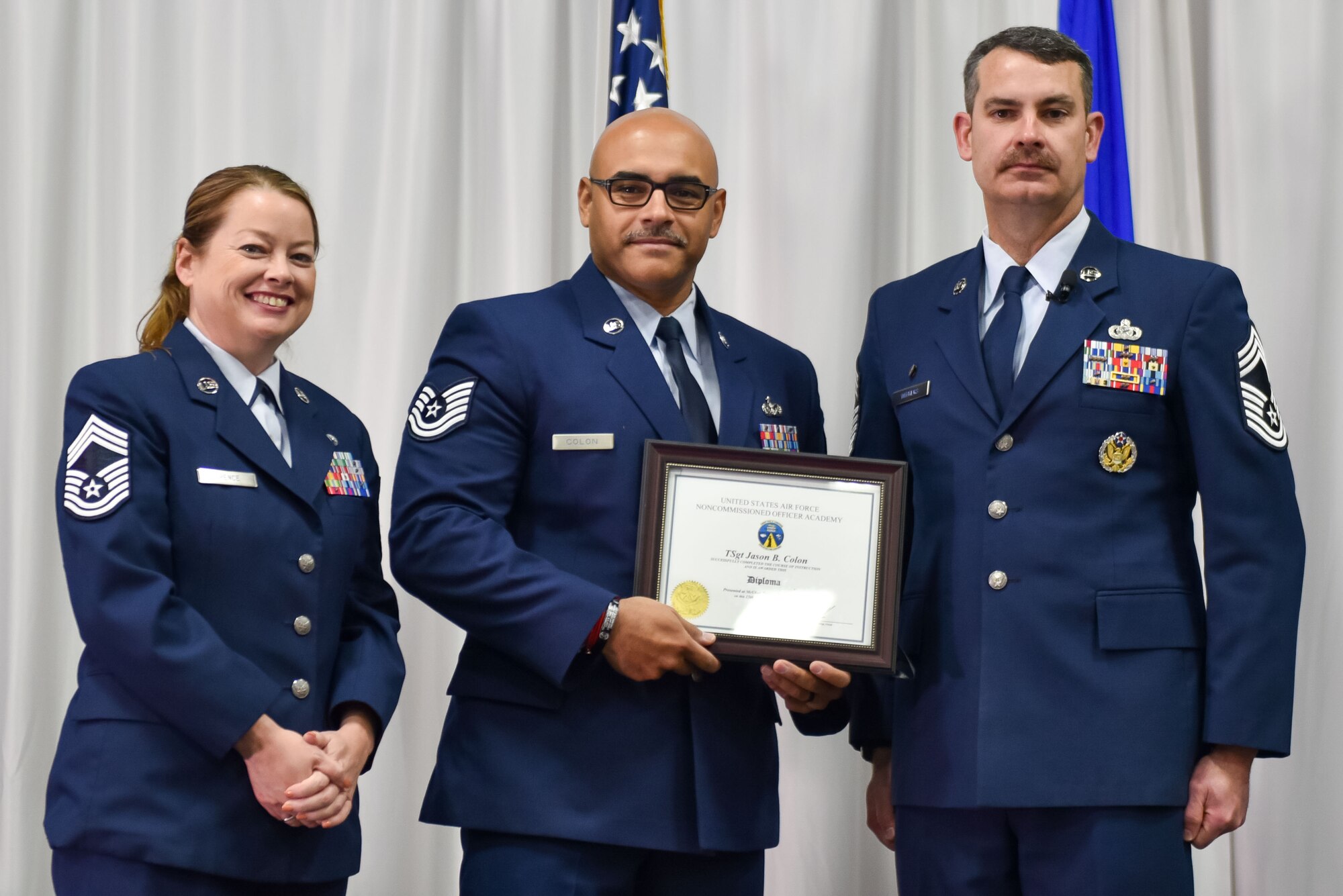 U.S. Air Force Technical Sgt. Jason Colon is recognized as a distinguished graduate during Non-Commissioned Officer Academy class 24-1 graduation, November 15, 2023, at the Training and Education Center (TEC), McGhee Tyson Air National Guard Base, Tenn. The Lankford Enlisted Professional Military Education Center is one of three divisions of the TEC that accommodates 2,000 service members annually from the Total Force, Coast Guard, and partner nations. (Photo by Master Sgt. Regina Young)