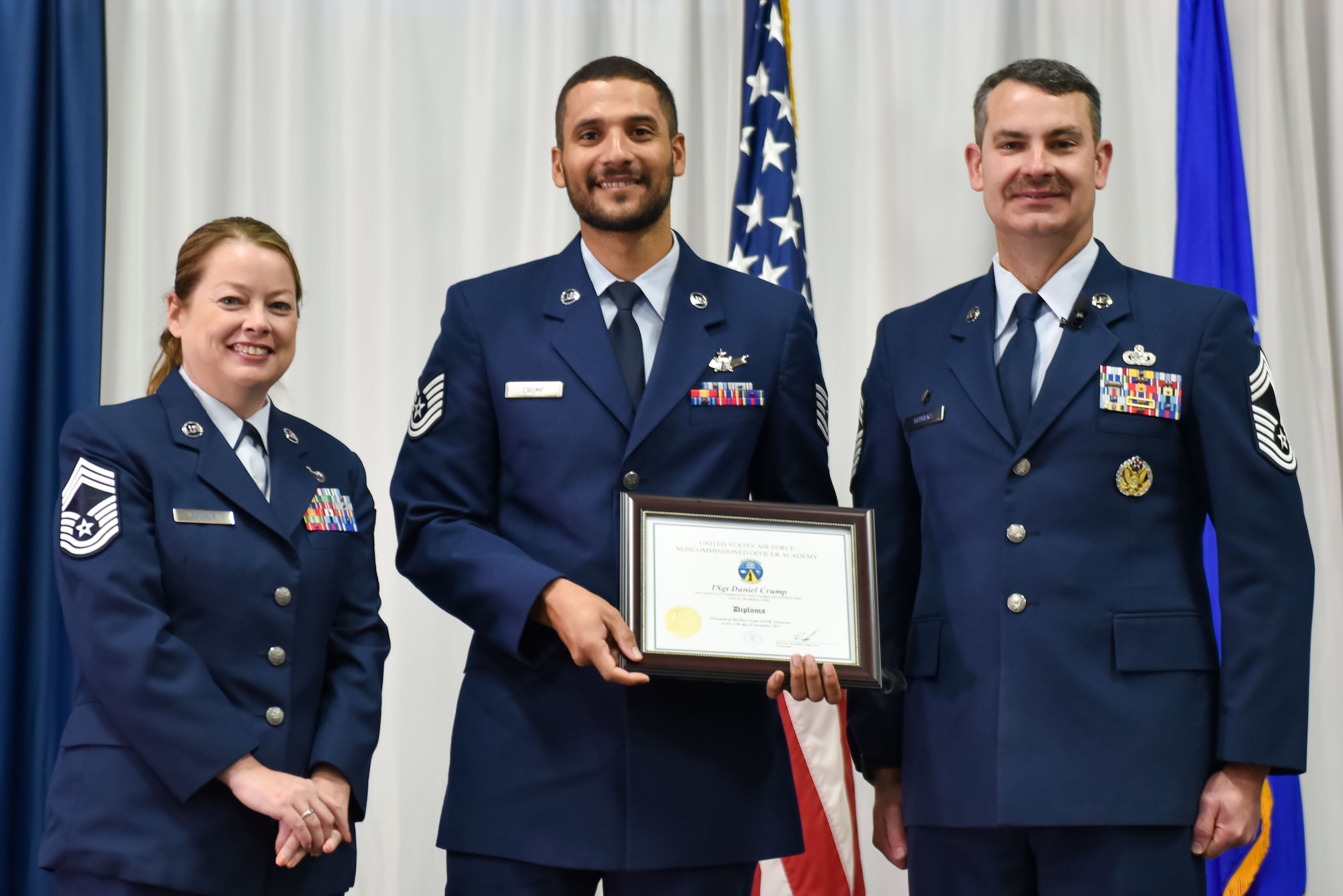 U.S. Air Force Technical Sgt. Daniel Crump is recognized as a distinguished graduate during Non-Commissioned Officer Academy class 24-1 graduation, November 15, 2023, at the Training and Education Center (TEC), McGhee Tyson Air National Guard Base, Tenn. The Lankford Enlisted Professional Military Education Center is one of three divisions of the TEC that accommodates 2,000 service members annually from the Total Force, Coast Guard, and partner nations. (Photo by Master Sgt. Regina Young)