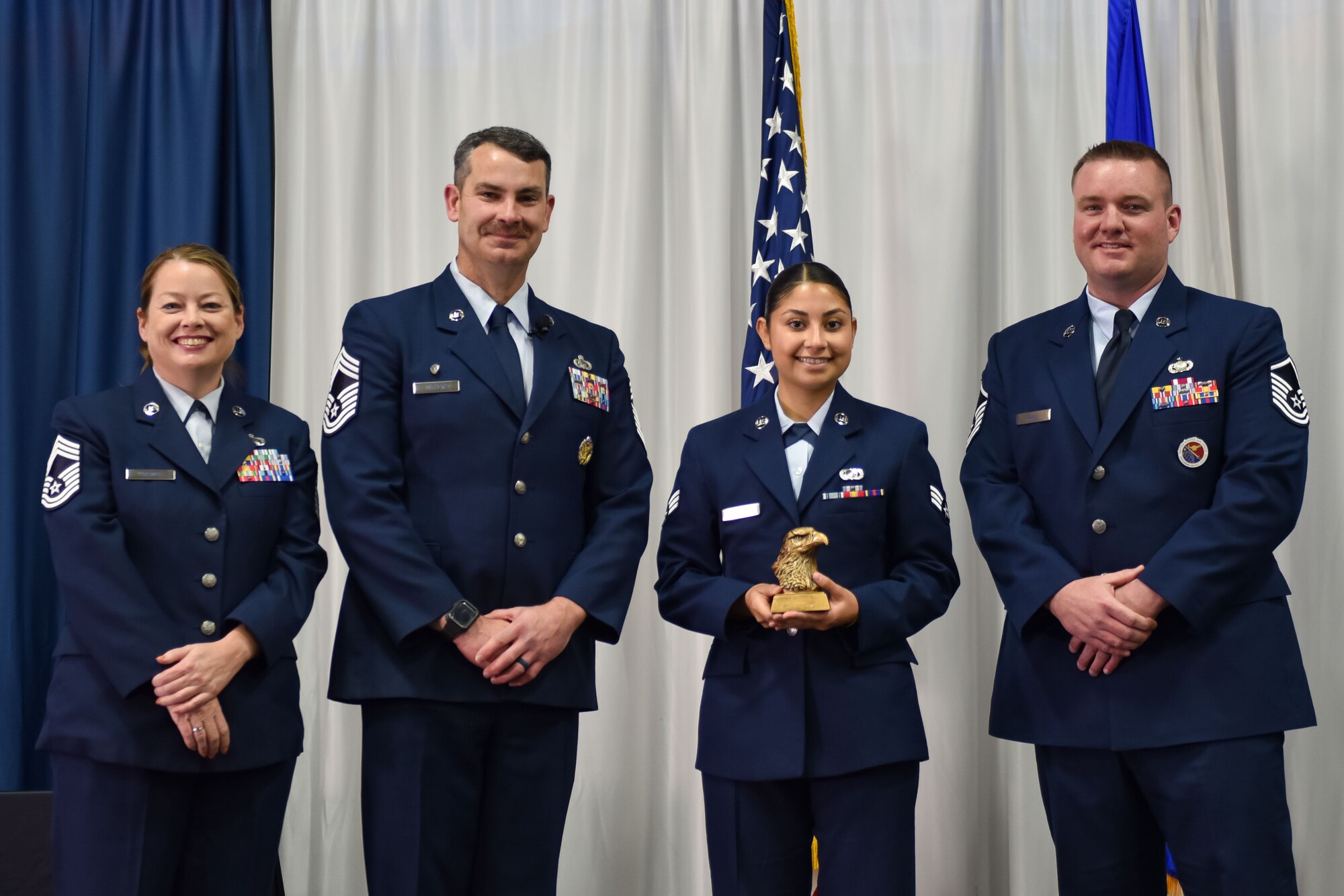 U.S. Air Force Senior Airman Dora Hernandez, receives the academic achievement award during Airman Leadership School class 24-1 graduation, November 15, 2023, at the Training and Education Center (TEC), McGhee Tyson Air National Guard Base, Tenn. The Lankford Enlisted Professional Military Education Center is one of three divisions of the TEC that accommodates 2,000 service members annually from the Total Force, Coast Guard, and partner nations. (Photo by Master Sgt. Regina Young)