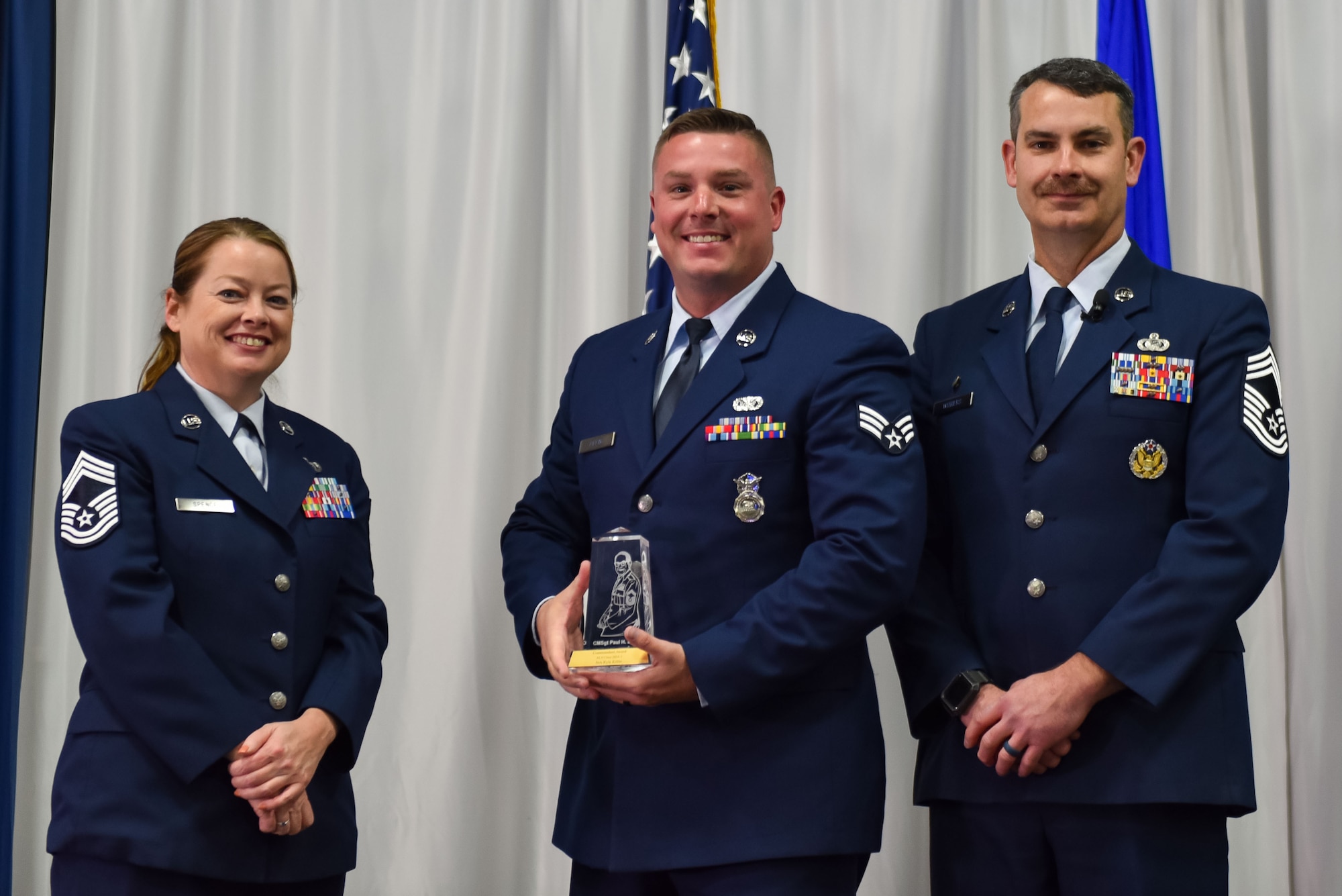 U.S. Air Force Senior Airman Kyle Killin, receives the Commandant Leadership award during Airman Leadership School class 24-1 graduation, November 15, 2023, at the Training and Education Center (TEC), McGhee Tyson Air National Guard Base, Tenn. The Lankford Enlisted Professional Military Education Center is one of three divisions of the TEC that accommodates 2,000 service members annually from the Total Force, Coast Guard, and partner nations. (Photo by Master Sgt. Regina Young)