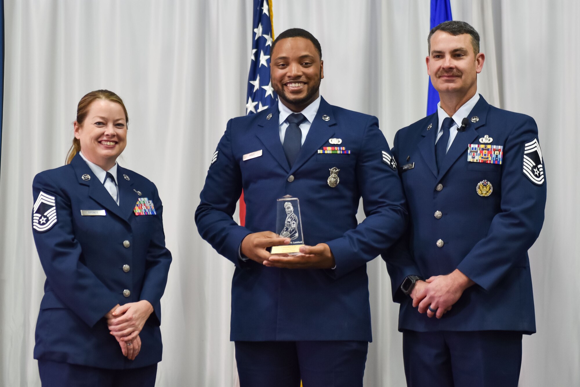 U.S. Air Force Senior Airman Darrion Wade, receives the Commandant Leadership award during Airman Leadership School class 24-1 graduation, November 15, 2023, at the Training and Education Center (TEC), McGhee Tyson Air National Guard Base, Tenn. The Lankford Enlisted Professional Military Education Center is one of three divisions of the TEC that accommodates 2,000 service members annually from the Total Force, Coast Guard, and partner nations. (Photo by Master Sgt. Regina Young)