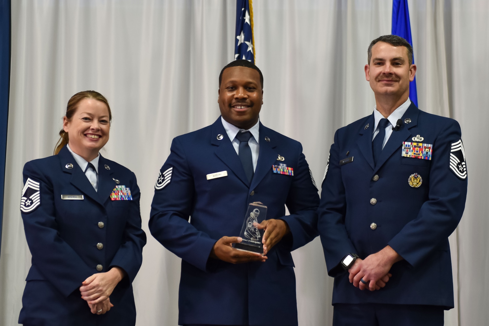 U.S. Air Force Technical Sgt. Kayshawn Joseph, receives the Commandant Leadership Award during Non-Commissioned Officers Academy class 24-1 graduation, November 15, 2023, at the Training and Education Center (TEC), McGhee Tyson Air National Guard Base, Tenn. The Lankford Enlisted Professional Military Education Center is one of three divisions of the TEC that accommodates 2,000 service members annually from the Total Force, Coast Guard, and partner nations. (Photo by Master Sgt. Regina Young)
