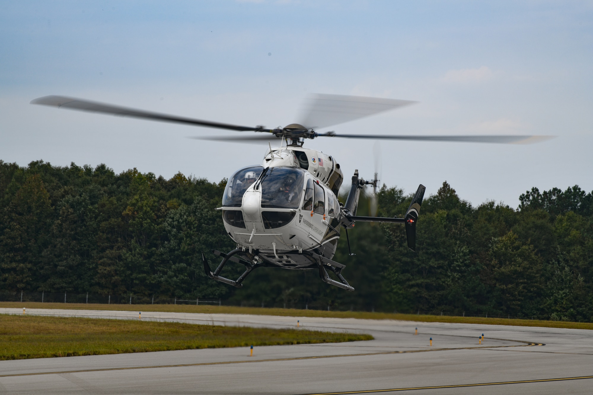 A medical helicopter from Vanderbilt LifeFlight prepares to land on the Arnold Air Force Base airfield during an active shooter exercise conducted Sept. 28, 2023, at Arnold AFB, Tenn. (U.S. Air Force photo by Keith Thornburgh)