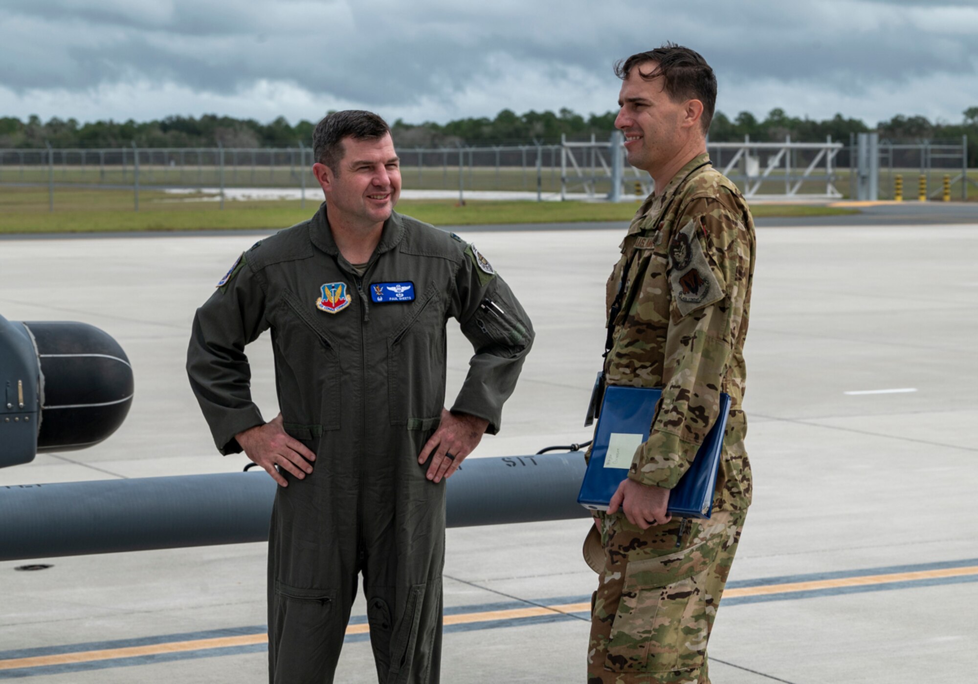 U.S. Air Force Col. Paul Sheets, 23rd Wing commander, left, talks with U.S. Air Force Maj. Benjamin Gransee, 23rd Wing director of inspections, during Mosaic Tiger 24-1 at Avon Park Air Force Range, Florida, Nov. 16, 2023. Gransee led a group of observers tasked with evaluating the exercise participants performance at the simulated contingency location. (U.S. Air Force photo by Airman 1st Class Leonid Soubbotine)